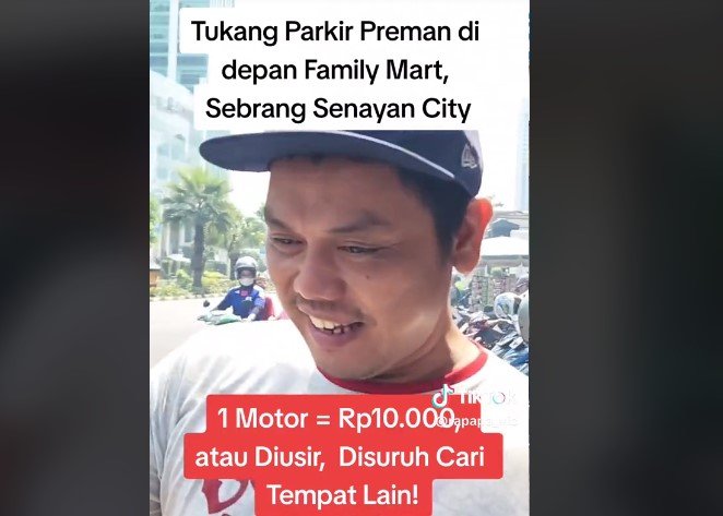 Juru parkir.