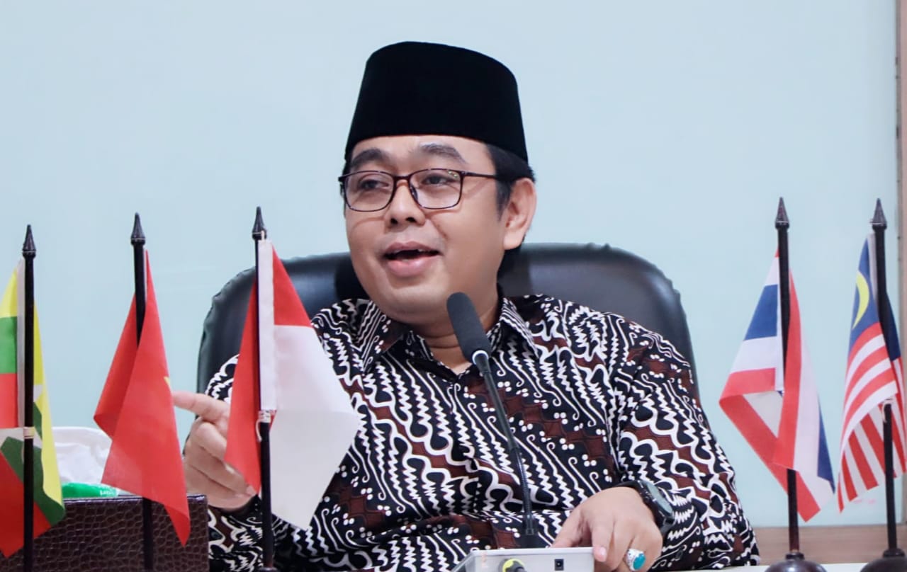 A. Tholabi Kharlie