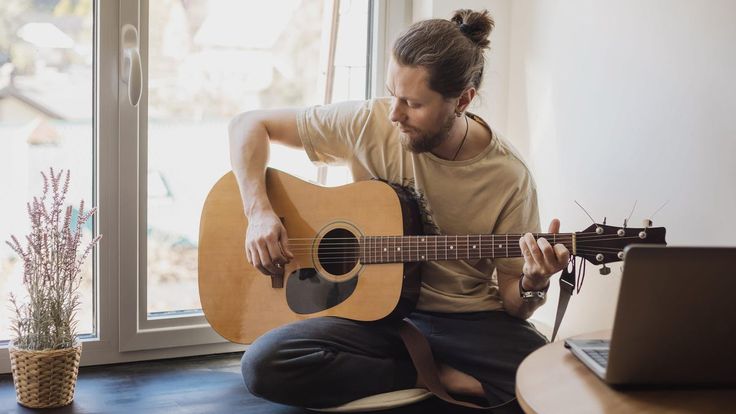 Boys play guitar beginner