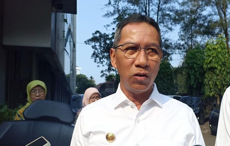 Heru Budi -Holopiscom
