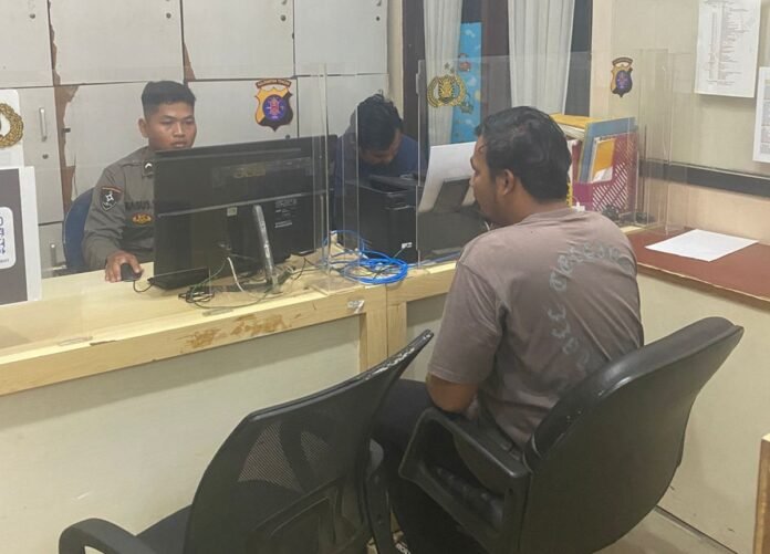 Afan Saat Membuat Laporan Polisi di Polda Kalimantan Tengah