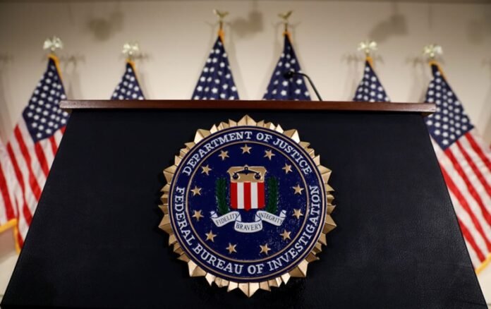 the podium for the director of the federal bureau of investigation is seen at fbi headquarters before his news conference in washington