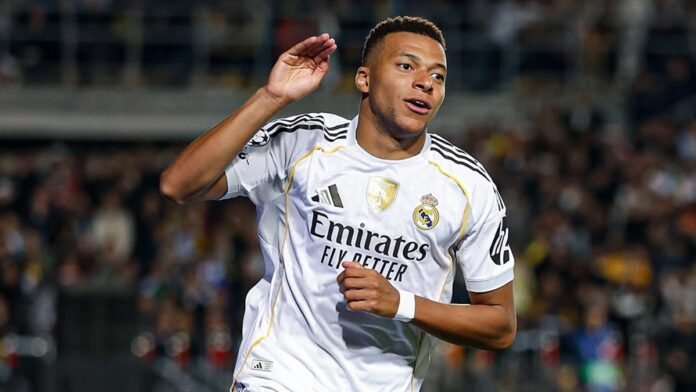 kylian mbappe saat selebrasi gol dalam kemenangan telak real madrid 5 0 atas kairat almaty di liga champions