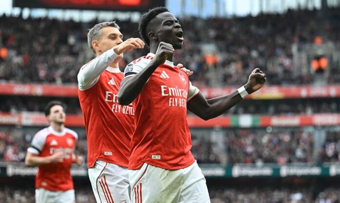 skuad arsenal selebrasi gol di liga inggris