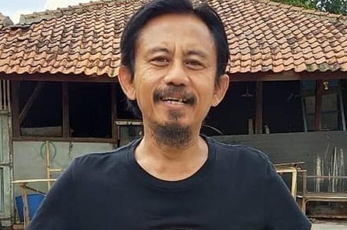 Epy Kusnandar Holopis.com