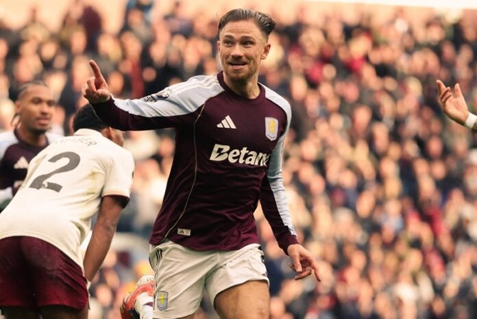 Matty Cash selebrasi gol lawan Arsenal - Holopis