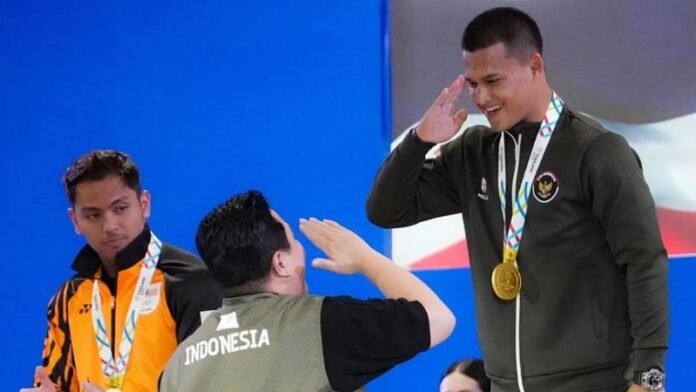 Letda Laut (E) Rizki Juniansyah raih emas Sea Games 2025._HOLOPIS.