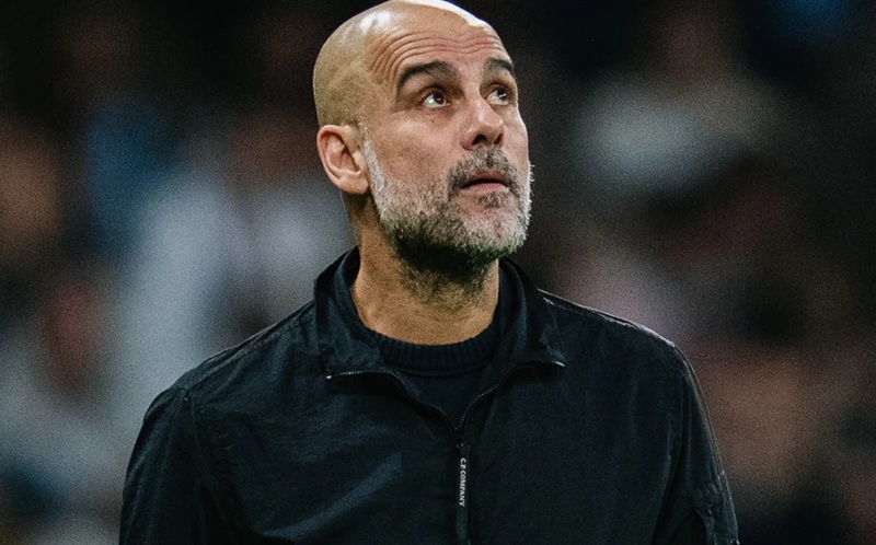 Pelatih Manchester City Pep Guardiola Holopis