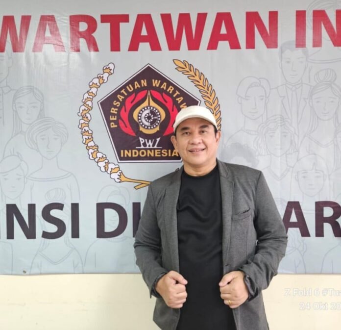 Holopis Zulmansyah PWI