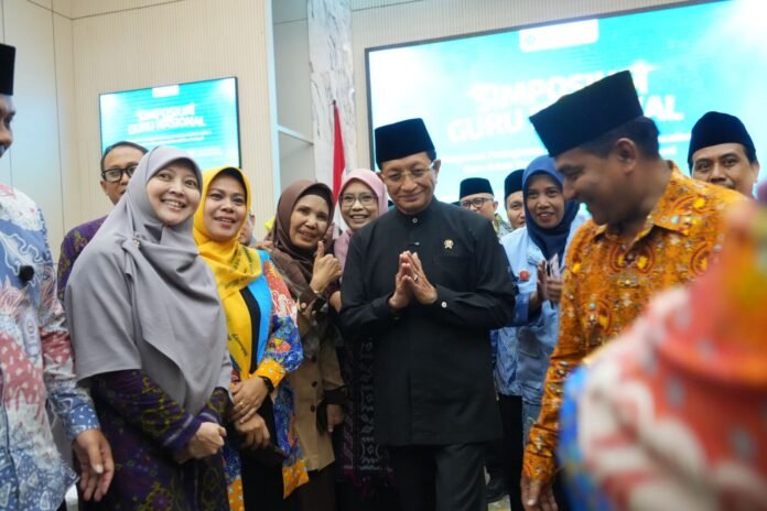 Nasaruddin Di Simposium Guru