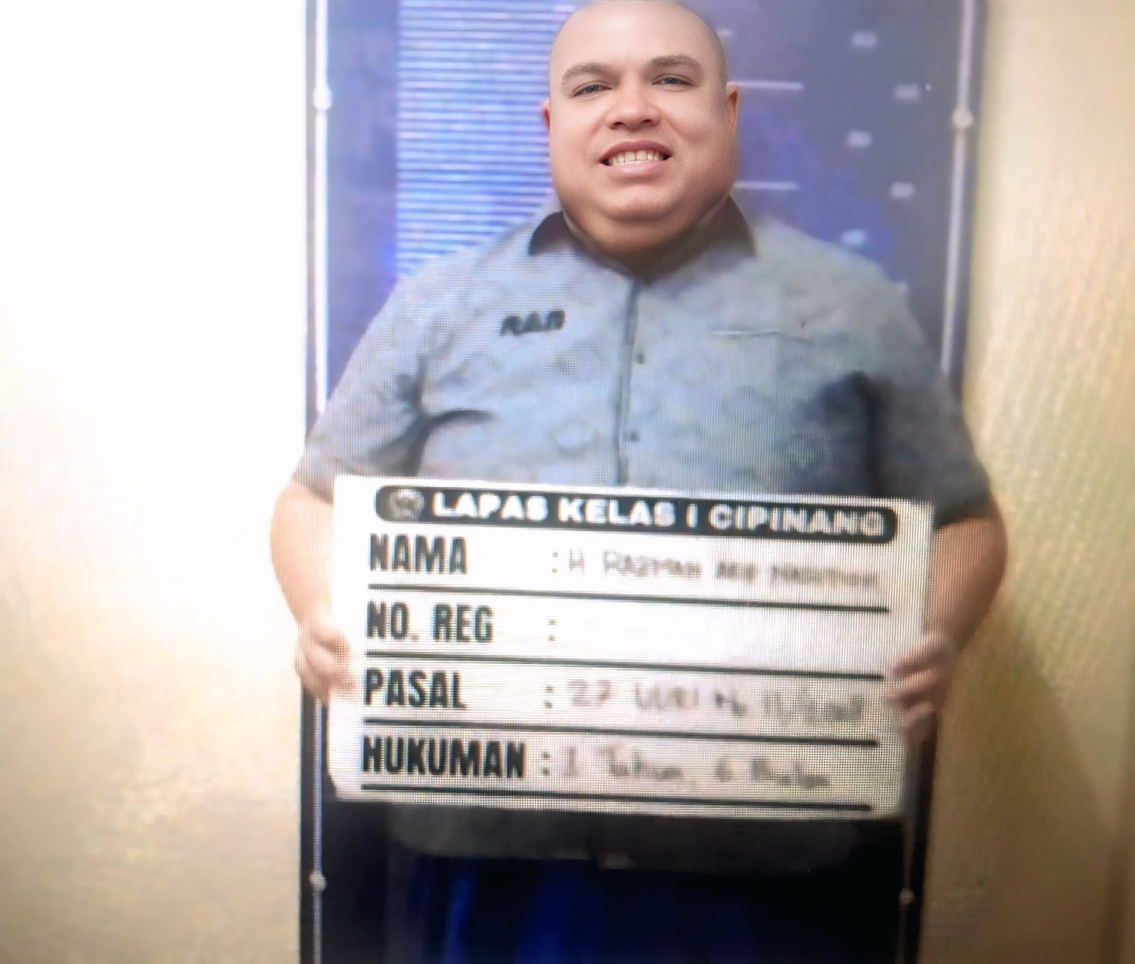 Razman Nasution Holopis