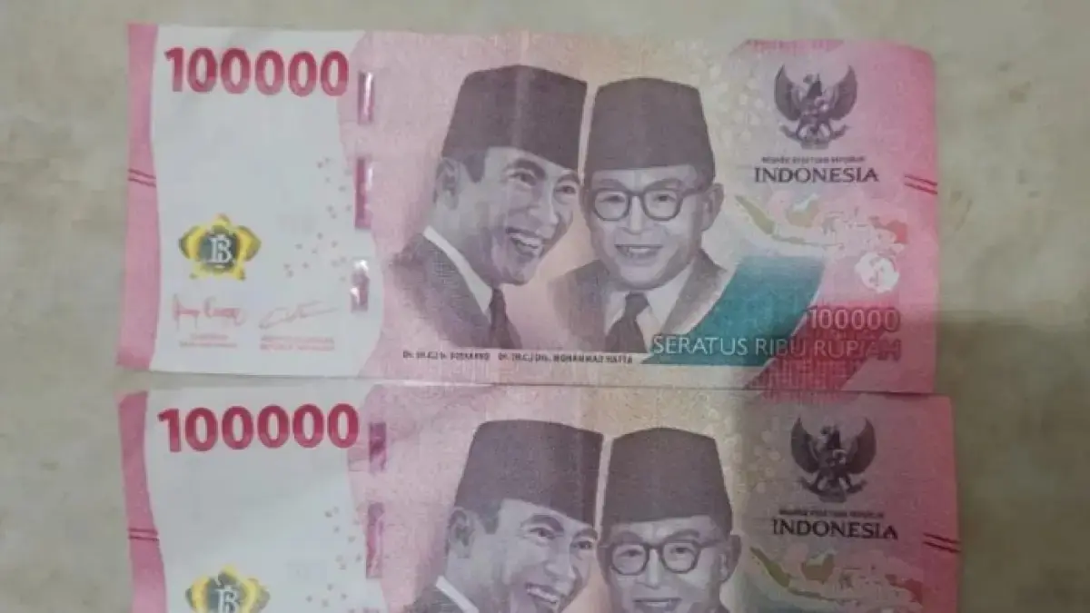 Uang 100 Ribu Holopis